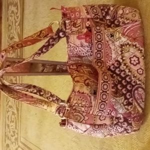 Vera Bradley bucket shoulder bag.